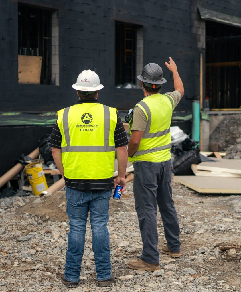 team inspecting commercial roof