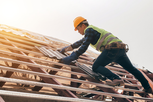 man doing roofing